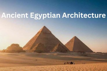 Ancient Egyptian Architecture, Pyramids of Giza at sunrise with golden light and clear sky